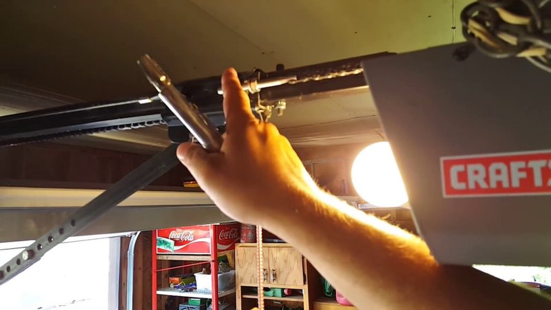 How To Adjusting The Chain Tension On Your Garage Door Opener