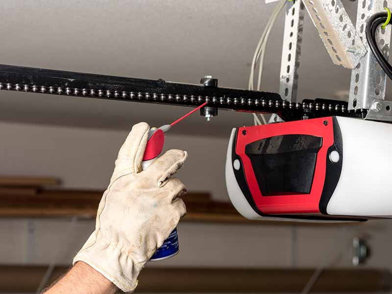How To Lubricate Your Screw Drive Garage Door Opener For Quieter Operation